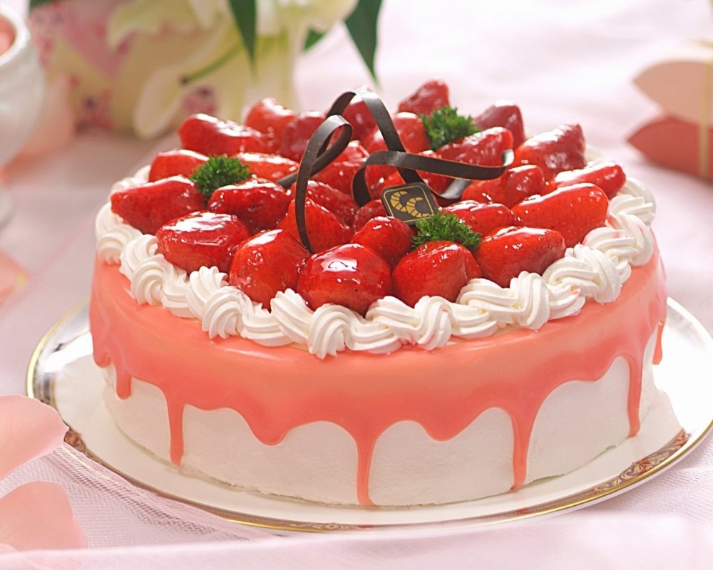 A beautiful wedding cake with floral decorations.